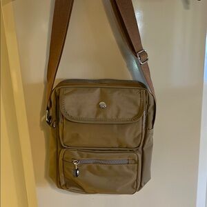 Tan Crossbody Bag with Adjustable Strap and Durable Fabric. Men or Women